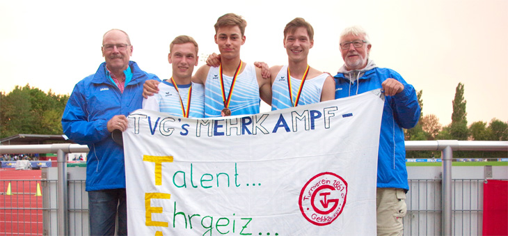 Gruppenfoto der Athleten Martin Kratz, Lars Richter und Timo Langstrof mit den Trainern Helmut Zülch und Willy Imhof